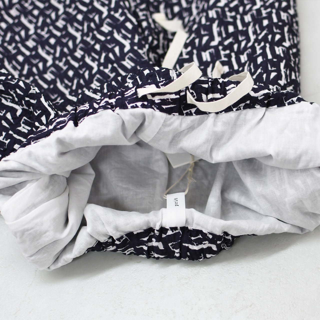 prit [プリット] 80/1ローンミラクルウェーブ加工幾何学プリントワイドパンツ [P72516]  [2025SS]