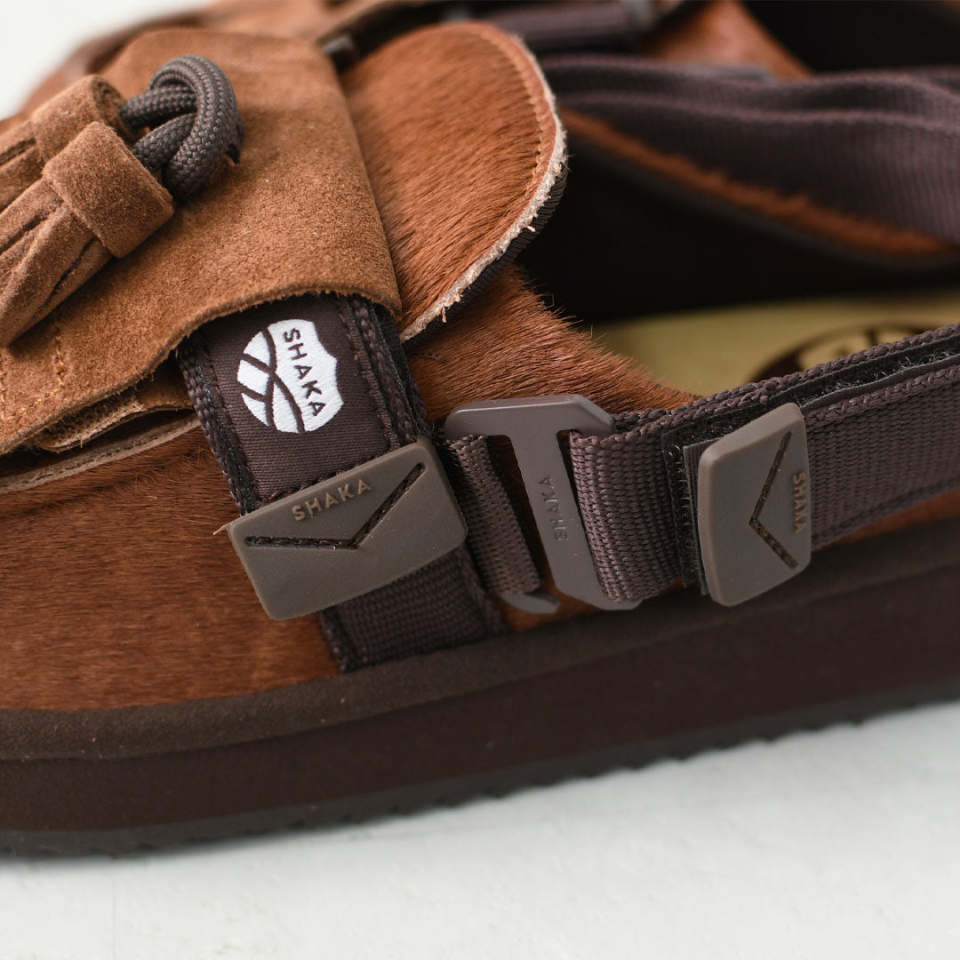 SHAKA [シャカ] MOC MULE TASSEL COWHAIR [SK-339] キルトタッセル付きミュールサンダル [2025AW]