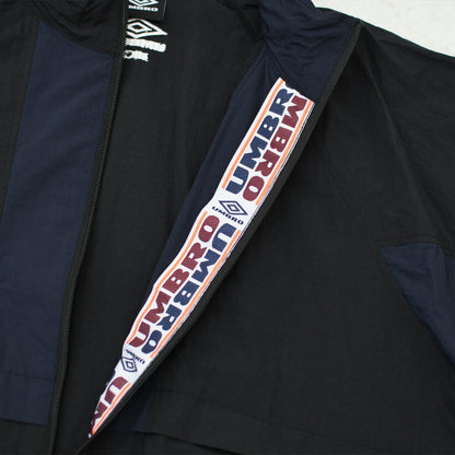 MICA&DEAL [マイカアンドディール] UMBRO collabo bi-color bz [0126306110] アンブロコラボバイカラービーズ・ジャケット・ナイロン製・防寒・アウター・コラボ商品・LADY'S [2026SS]