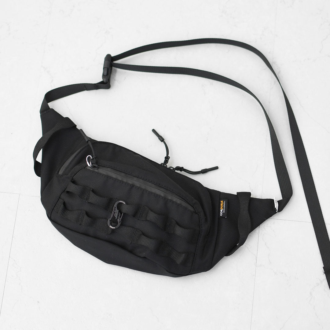 CMF OUTDOOR GARMENT [コムフィアウトドアガーメント] FANNY PACK BALLISTIC  [CMF2601-AC15] ファニィパックバリスティック・プチバック・ボディーバッグ・ミニバッグ・アウトドア・旅行・キャンプ MEN'S / LADY'S [2027SS]