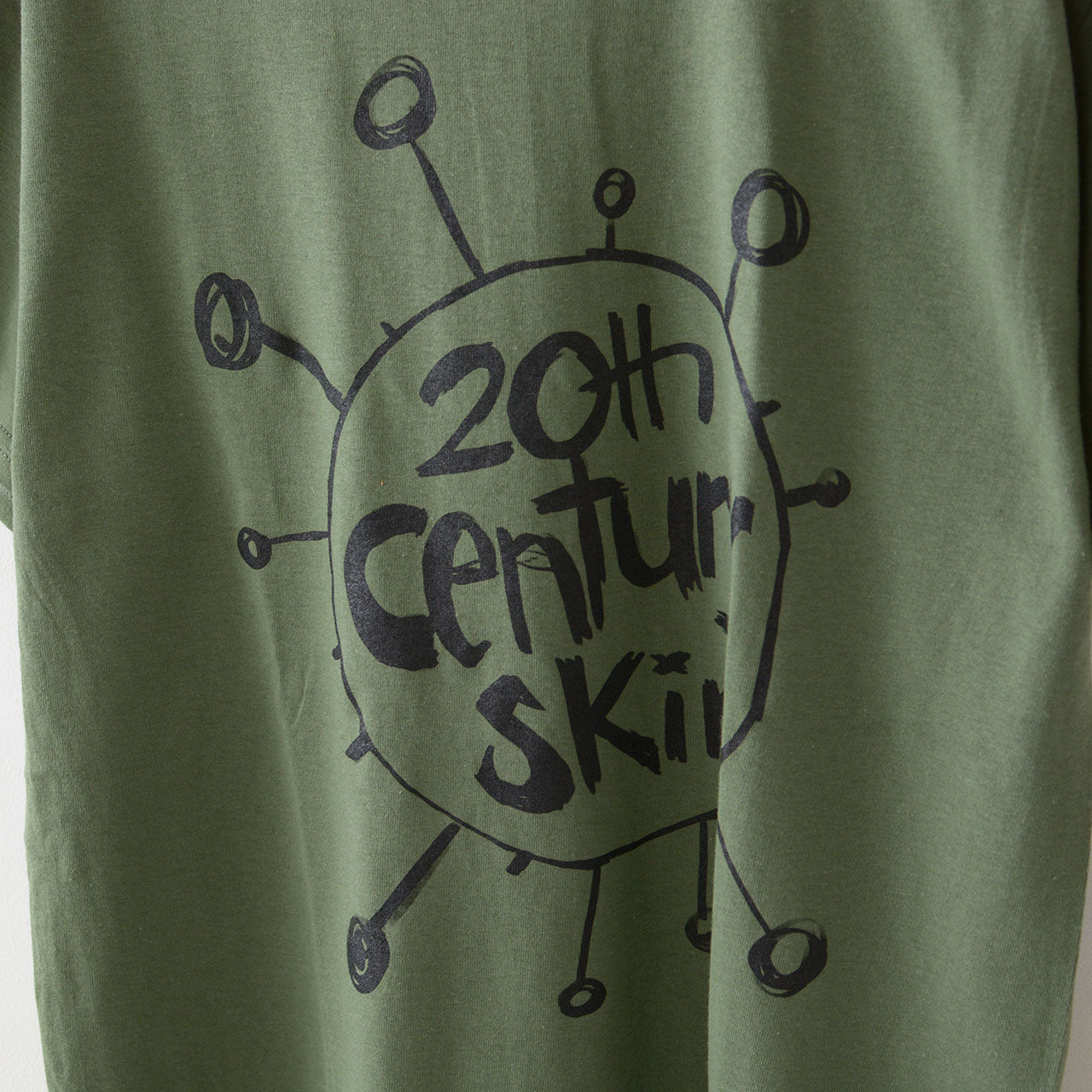 NORTS MUSIC TEE [ノーツ ミュージック ティー] PRINT TEE MUSIC -20th Century Skin- (As Worn By Thom Yorke, Radiohead) [20th century] プリント ミュージック Tシャツ 20th センチュリー スキン [2024SS]