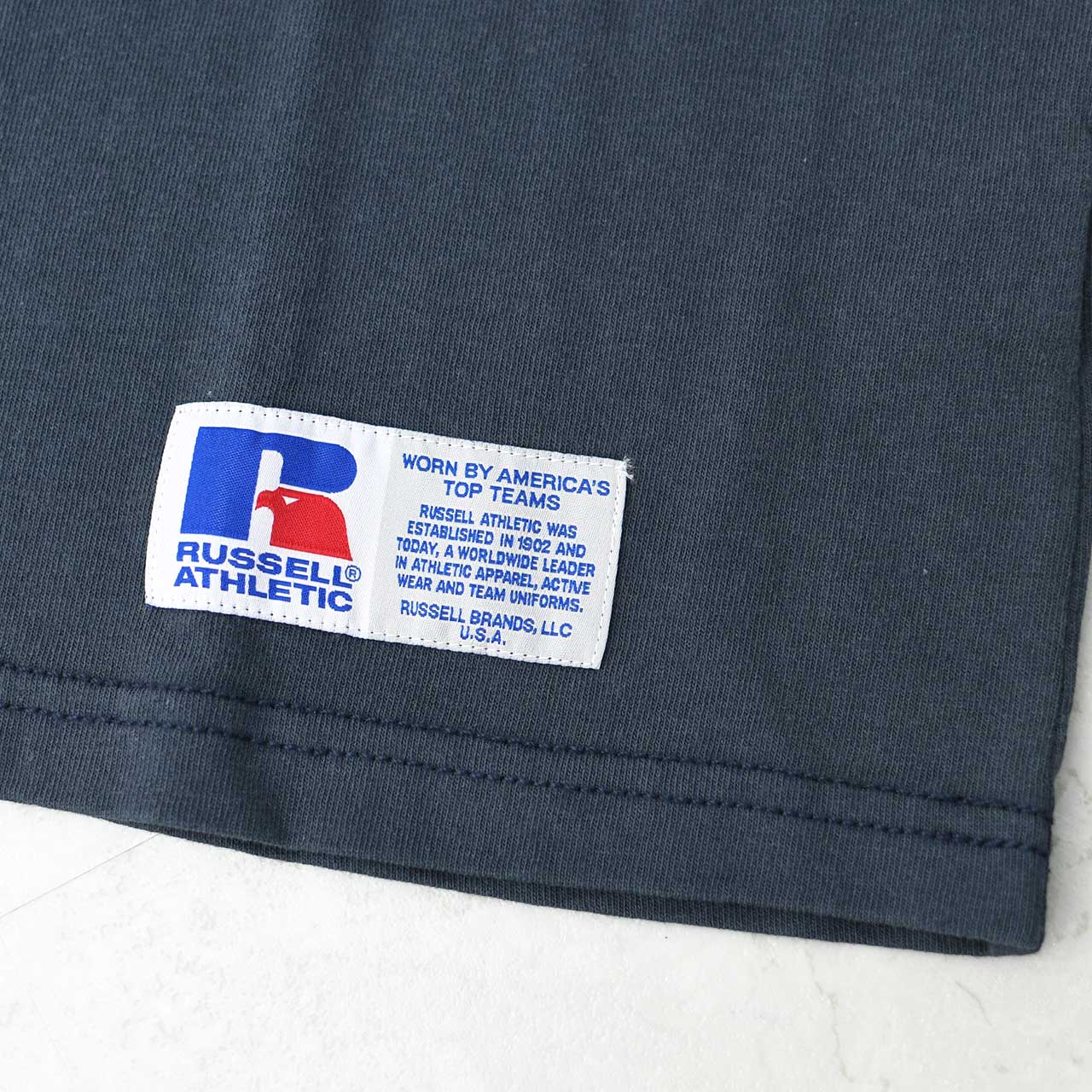 RUSSELL ATHLETIC [ラッセルアスレティック] BOOKSTRE Jersey S/S Classic Arch Logo T [RC-25509] ブックストアジャージーショートスリーブクラッシックアーチロゴティーシャツ [2025SS]