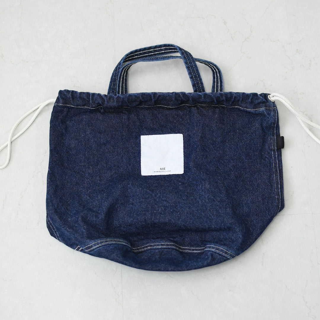 N.P.E NAPRON PATIENTS EFFECTS BAG [エヌピーイーナプロンペイシェントエフェクトバッグ] BLEACHED DENIM PATIENTS BAG M [NPE01-7307M] ブリーチド デニム ペイシェントバッグ M・ペイシェントバッグ・巾着バッグ・コットンバッグ・MEN'S / LADY'S [2026SS]