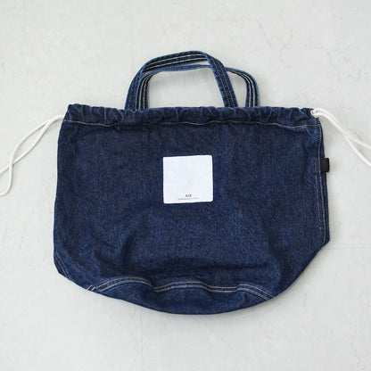 N.P.E NAPRON PATIENTS EFFECTS BAG [エヌピーイーナプロンペイシェントエフェクトバッグ] BLEACHED DENIM PATIENTS BAG M [NPE01-7307M] ブリーチド デニム ペイシェントバッグ M・ペイシェントバッグ・巾着バッグ・コットンバッグ・MEN'S / LADY'S [2026SS]