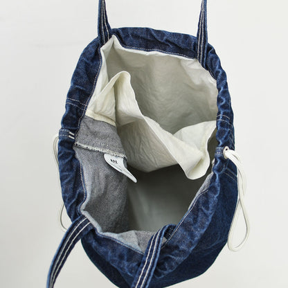 N.P.E NAPRON PATIENTS EFFECTS BAG [エヌピーイーナプロンペイシェントエフェクトバッグ] BLEACHED DENIM PATIENTS BAG M [NPE01-7307M] ブリーチド デニム ペイシェントバッグ M・ペイシェントバッグ・巾着バッグ・コットンバッグ・MEN'S / LADY'S [2026SS]