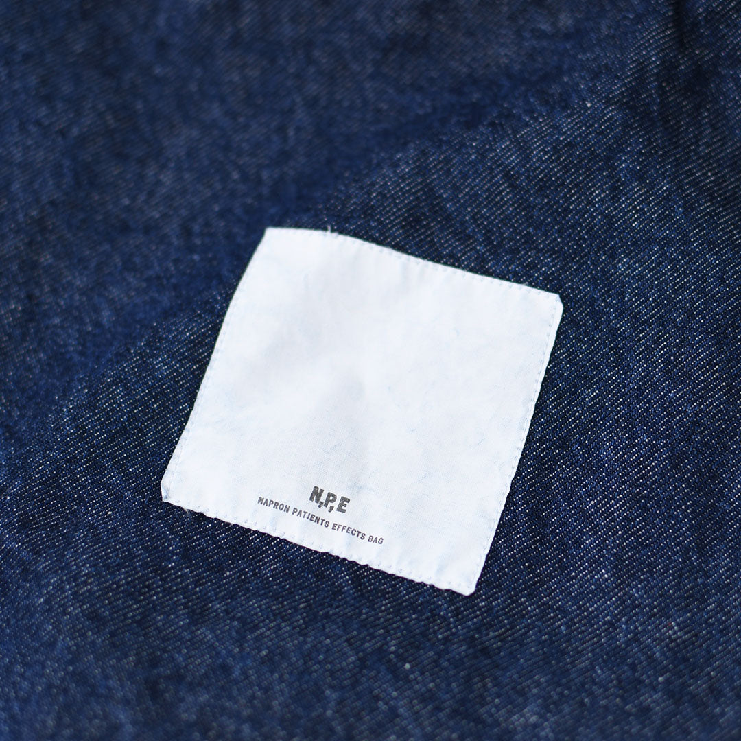 N.P.E NAPRON PATIENTS EFFECTS BAG [エヌピーイーナプロンペイシェントエフェクトバッグ] BLEACHED DENIM PATIENTS BAG XL  [NPE01-7307XL] ブリーチド デニム ペイシェントバッグ XL・ペイシェントバッグ・巾着バッグ・コットンバッグ・MEN'S / LADY'S [2026SS]