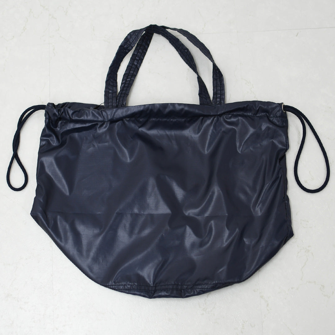 N.P.E [エヌピーイー] PET BOTTLE RECYCLING PACKABLE PATIENTS BAG [NPE01-8888] ペットボトルリサイクリングパッカブルペイシェントバッグ・ペイシェントバッグ・パッカブル・ロゴバッグ・エコバッグ・リサイクル素材・サステナブル・MEN'S / LADY'S [2026SS]