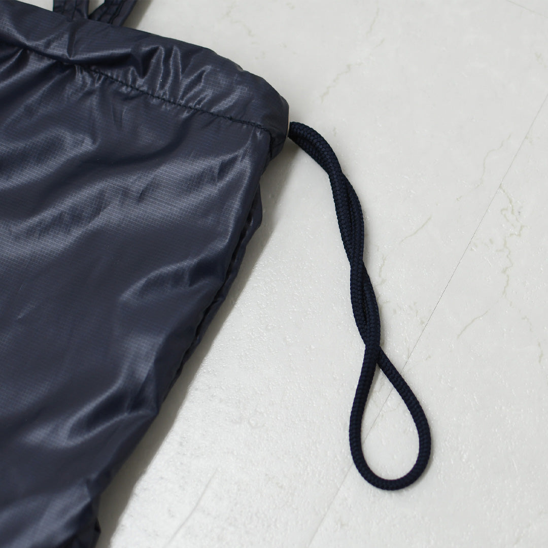 N.P.E [エヌピーイー] PET BOTTLE RECYCLING PACKABLE PATIENTS BAG [NPE01-8888] ペットボトルリサイクリングパッカブルペイシェントバッグ・ペイシェントバッグ・パッカブル・ロゴバッグ・エコバッグ・リサイクル素材・サステナブル・MEN'S / LADY'S [2026SS]