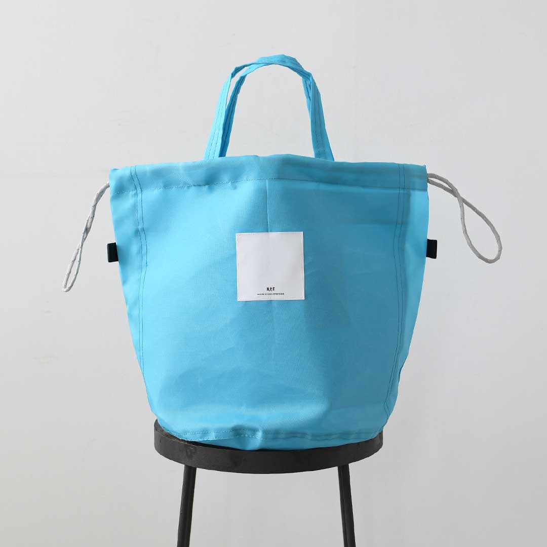 N.P.E NAPRON PATIENTS EFFECTS BAG M [エヌピーイーナプロンペイシェントエフェクトバッグ] NEON PATIENTS BAG [NPE02-255] ネオンペイシェントバッグ・ペイシェントバッグ・巾着バッグ・ナイロンバッグ・サイズM・MEN'S / LADY'S [2026SS]